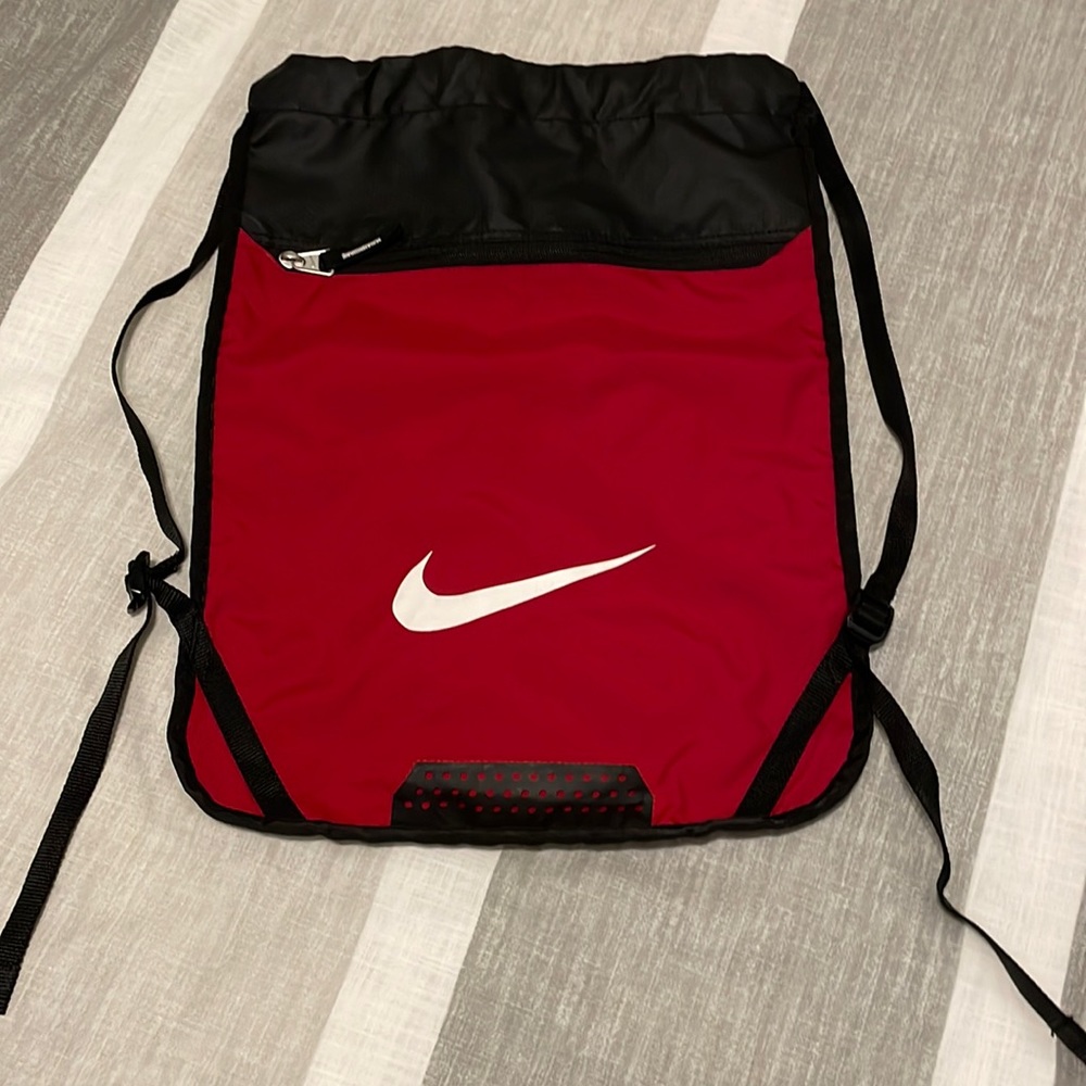 Nike Adjustable Backpack with separate outside zippered pocket.